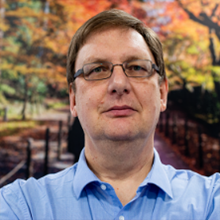 A headshot of Professor Andrew Booth