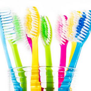 Toothbrushes in a glass