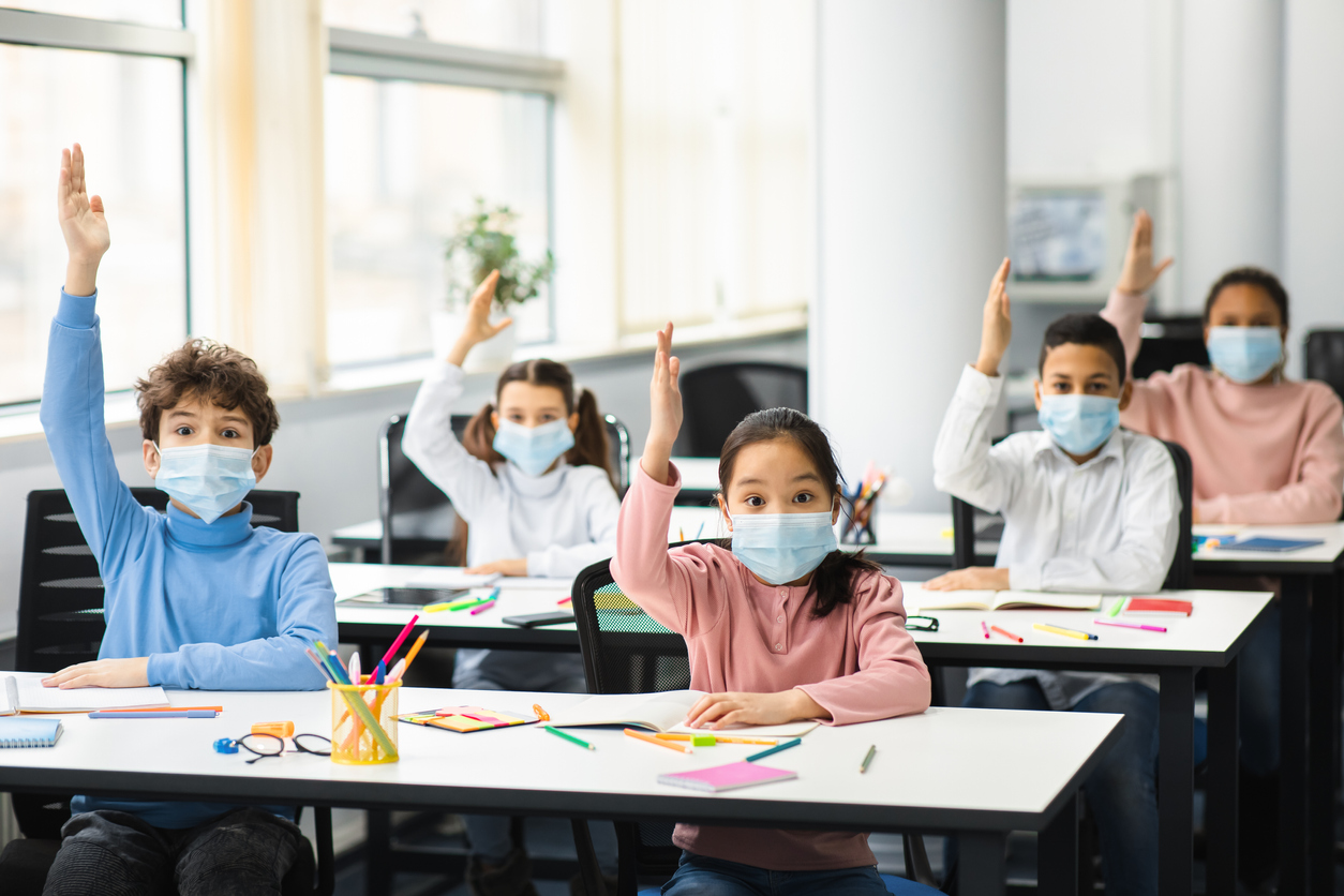 Classroom of children wearing masks