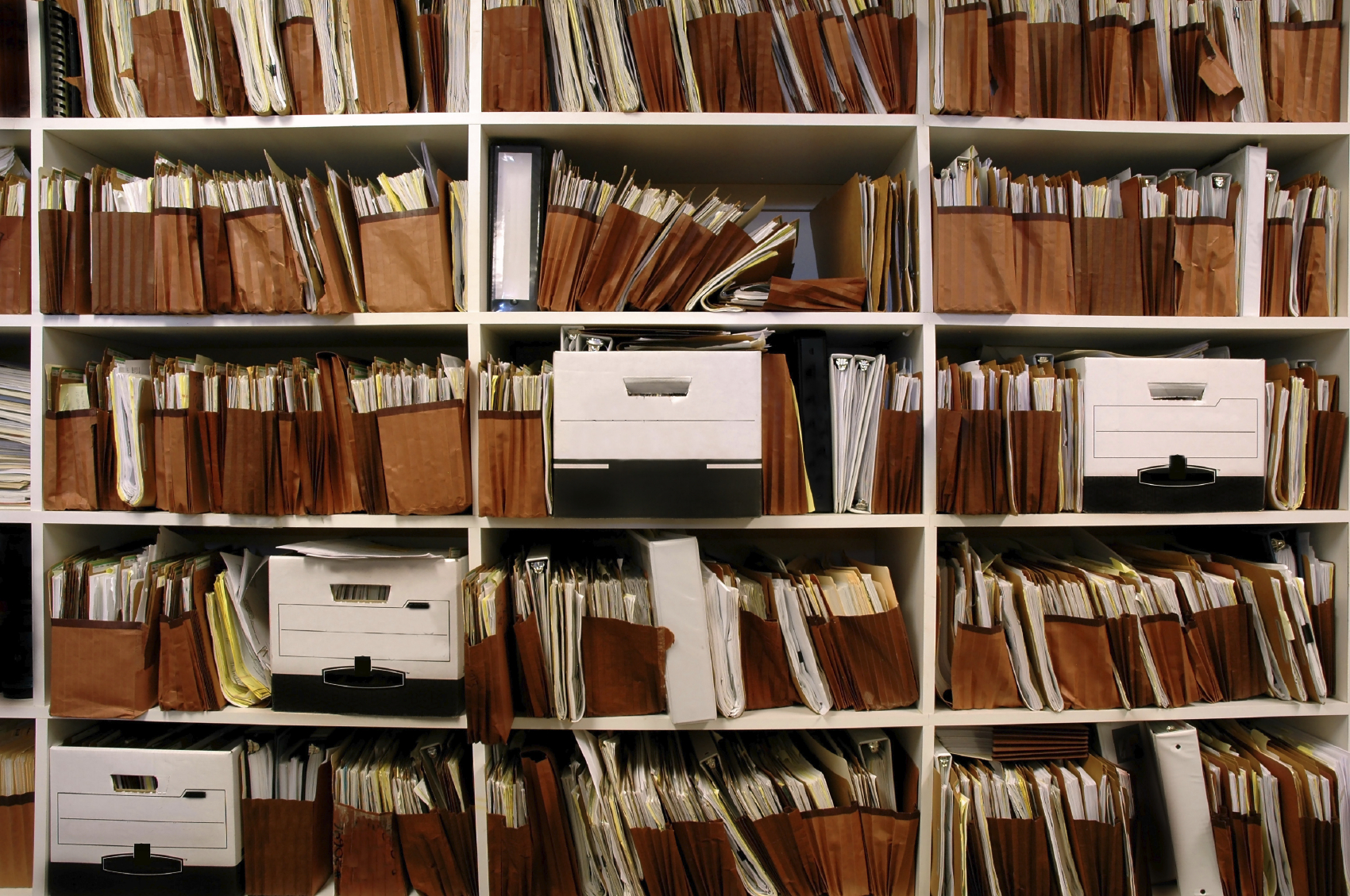 Shelving units full of boxes and folders