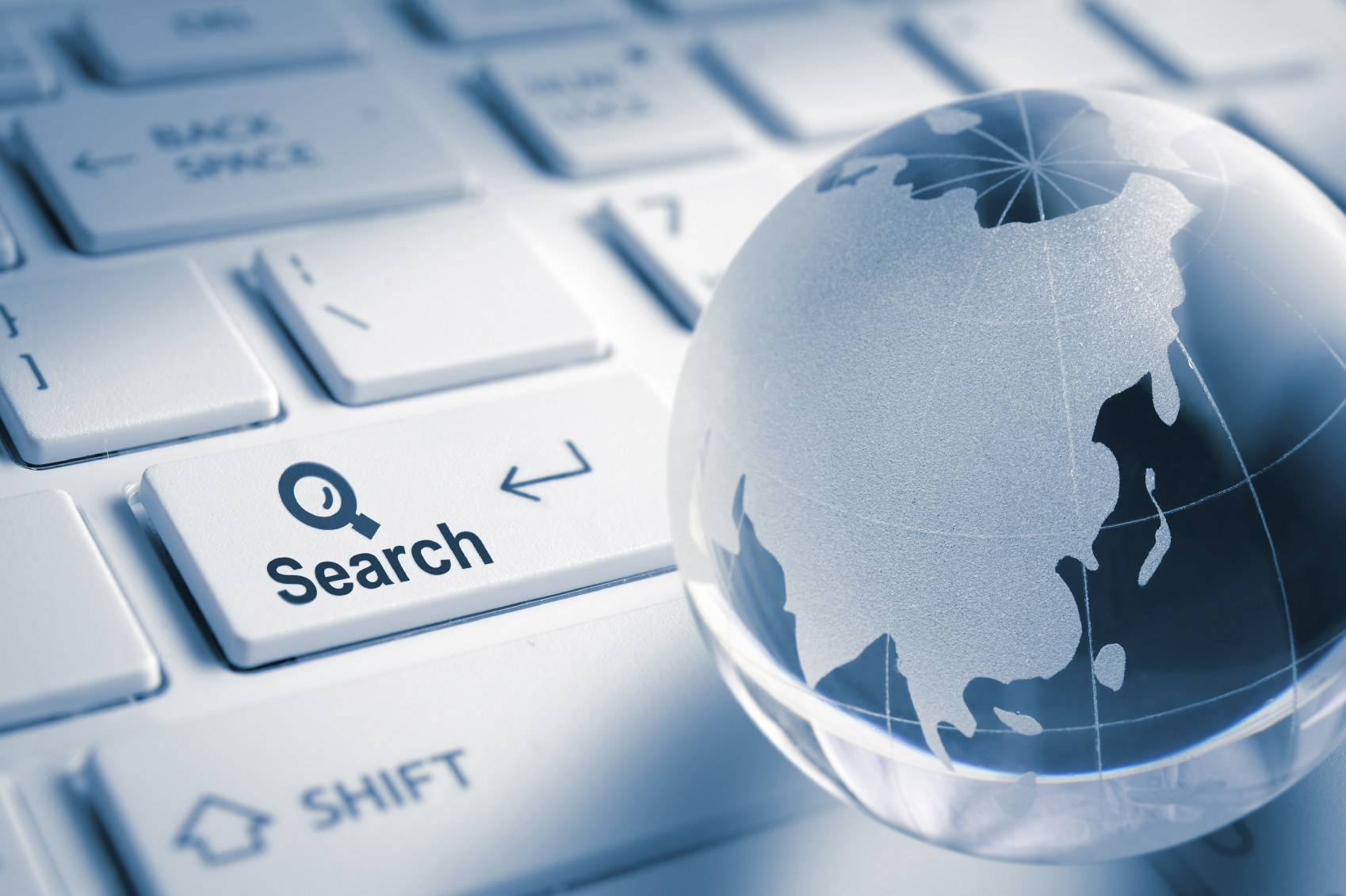 A globe on a keyboard