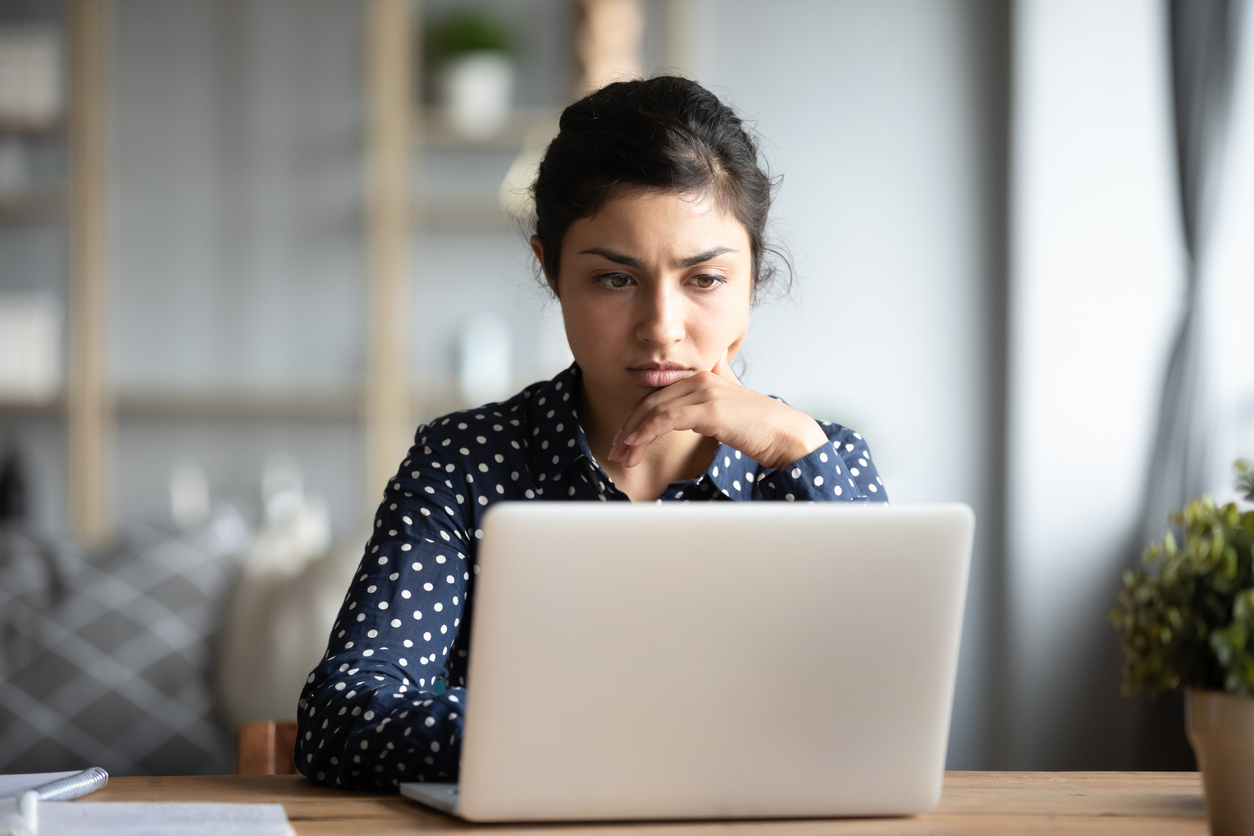 Woman working at a laptop