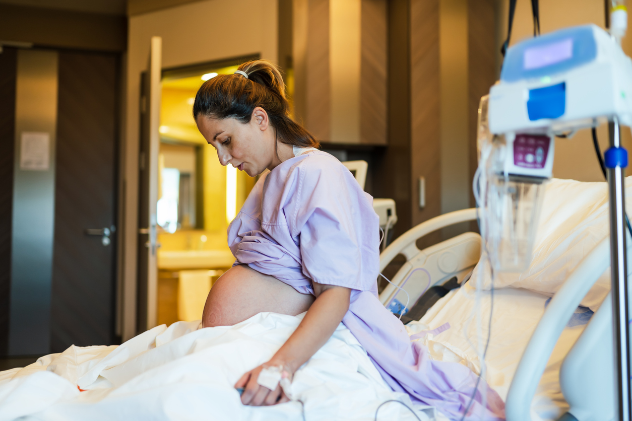 Person pregnant in hospital ward